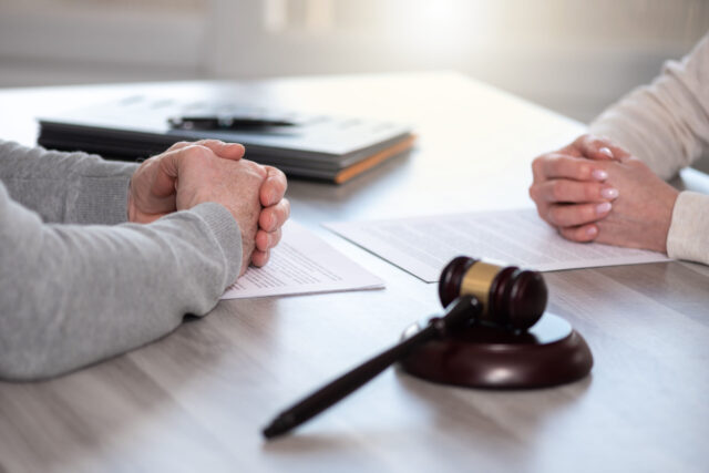lawyer discussing a case with a client