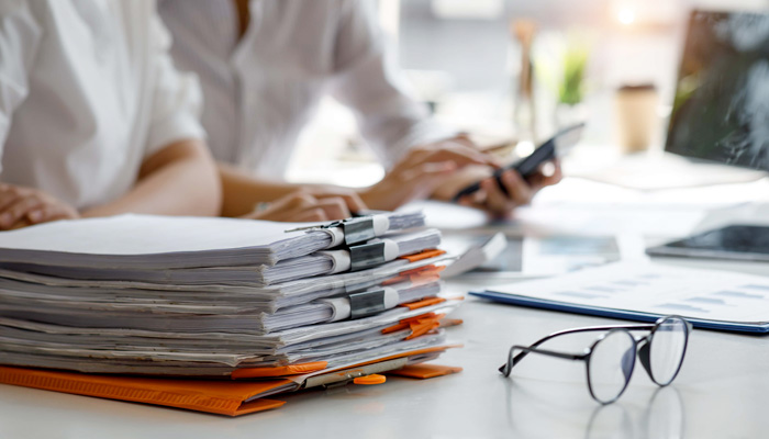 Auditor businesswoman checking searching document legal prepare paperwork or report