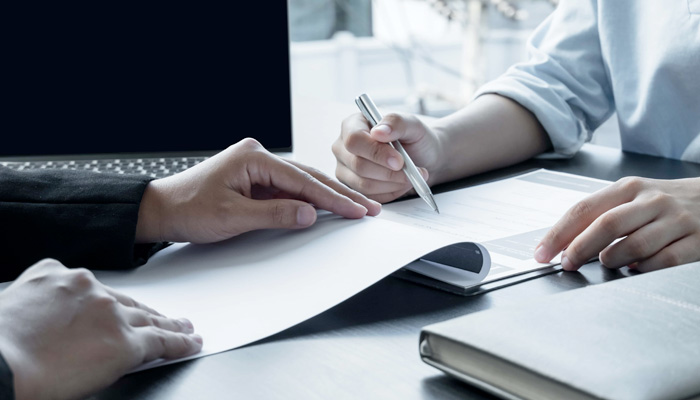 Business people hold a resume and talk to job applicants for job interviews