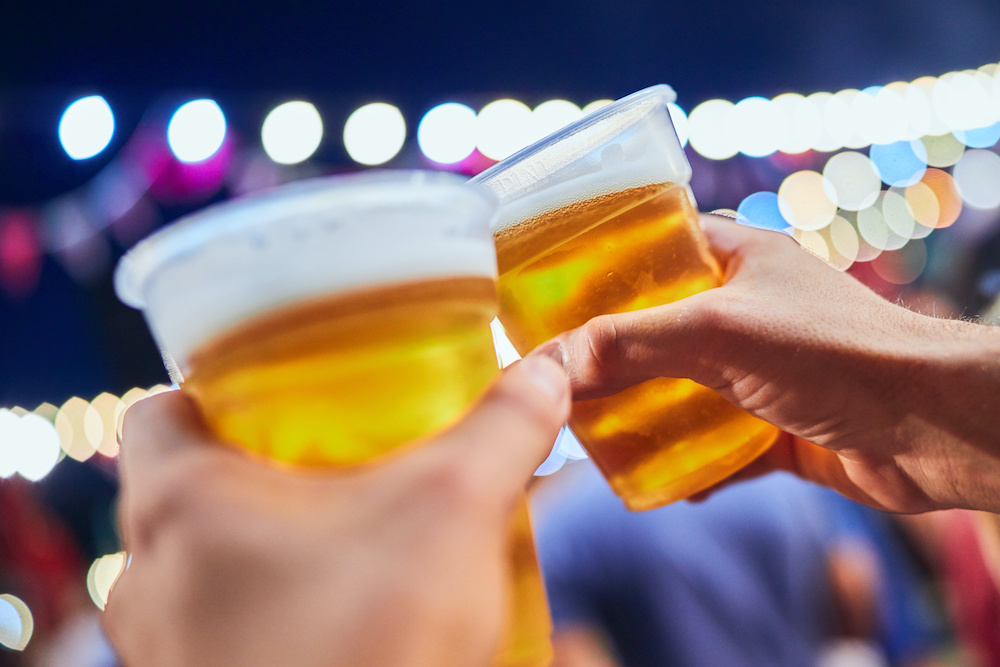 hands cheers with beer