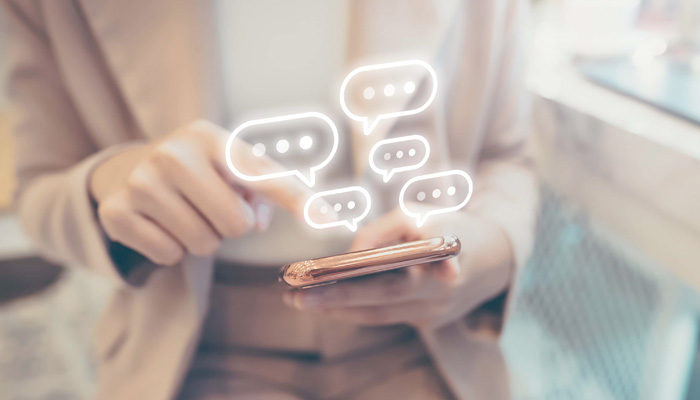 woman on phone with floating quote bubbles